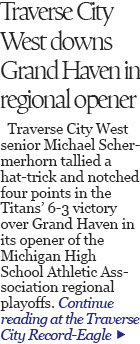 Hockey regionals roundup: Titans advance to semis against Bay Reps; Trojans topple Big North champ Petoskey, 2-1